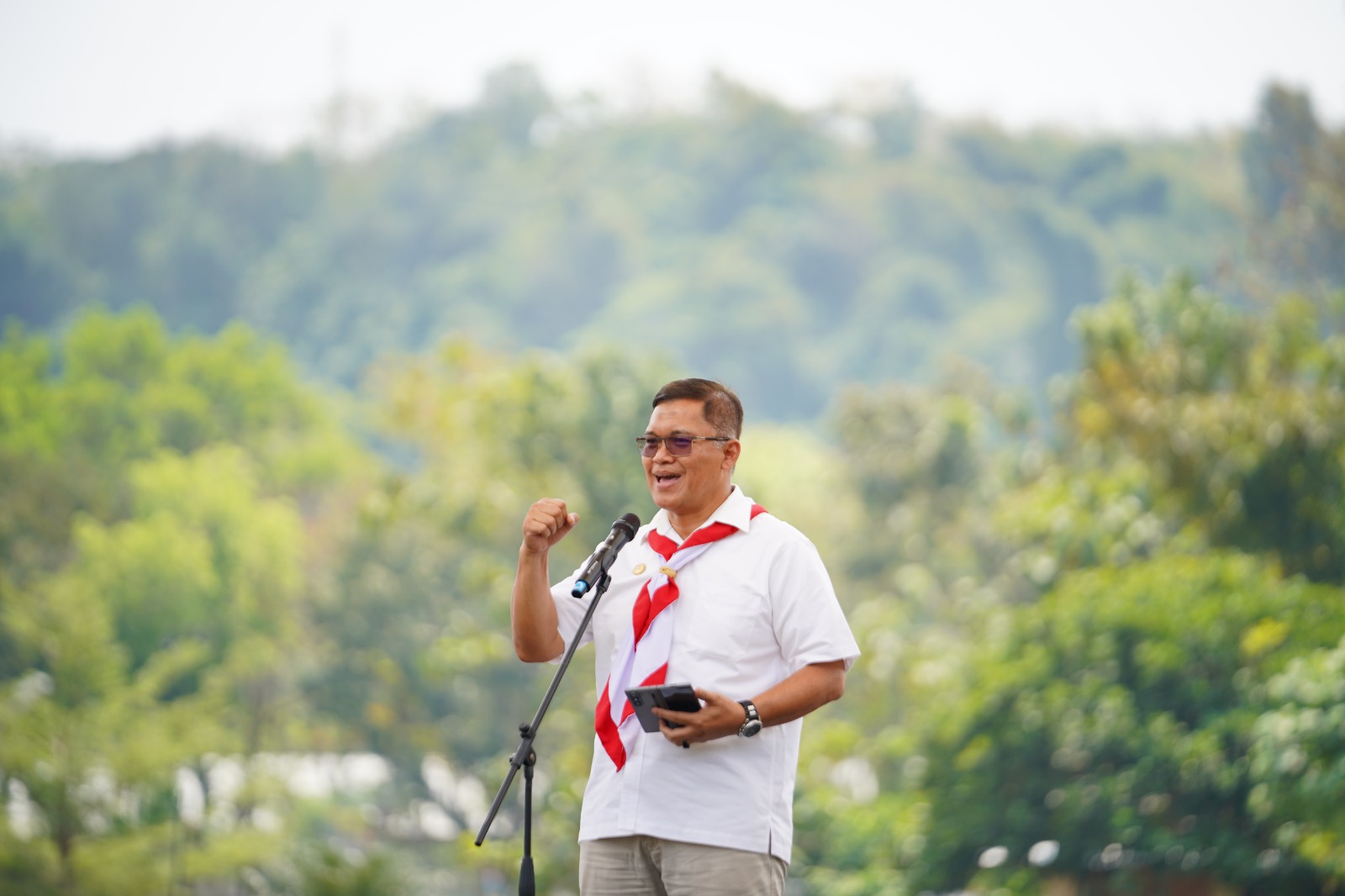 a man holding a microphone